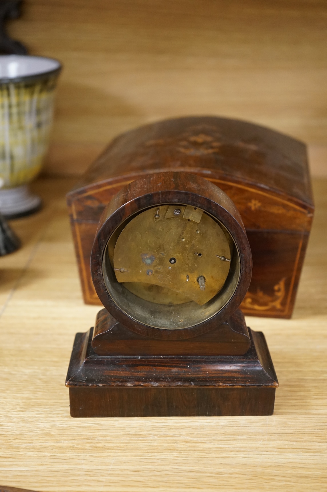 A 19th century rosewood and inlaid silk lined box, a small VAP timepiece and a carved page turner, largest 22cm wide